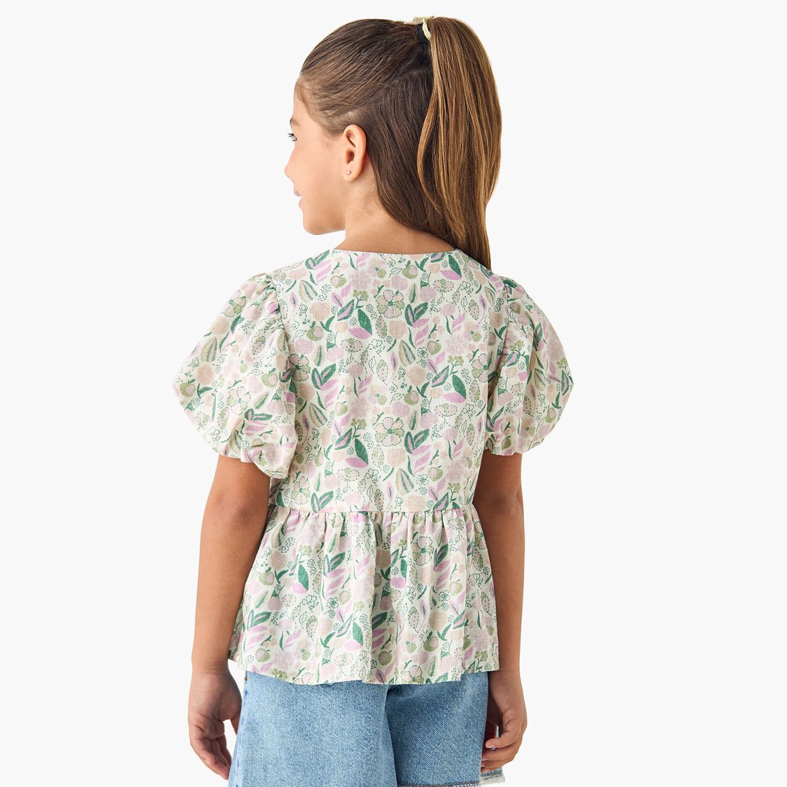 Juniors Floral Print Peplum Top with Round Neck