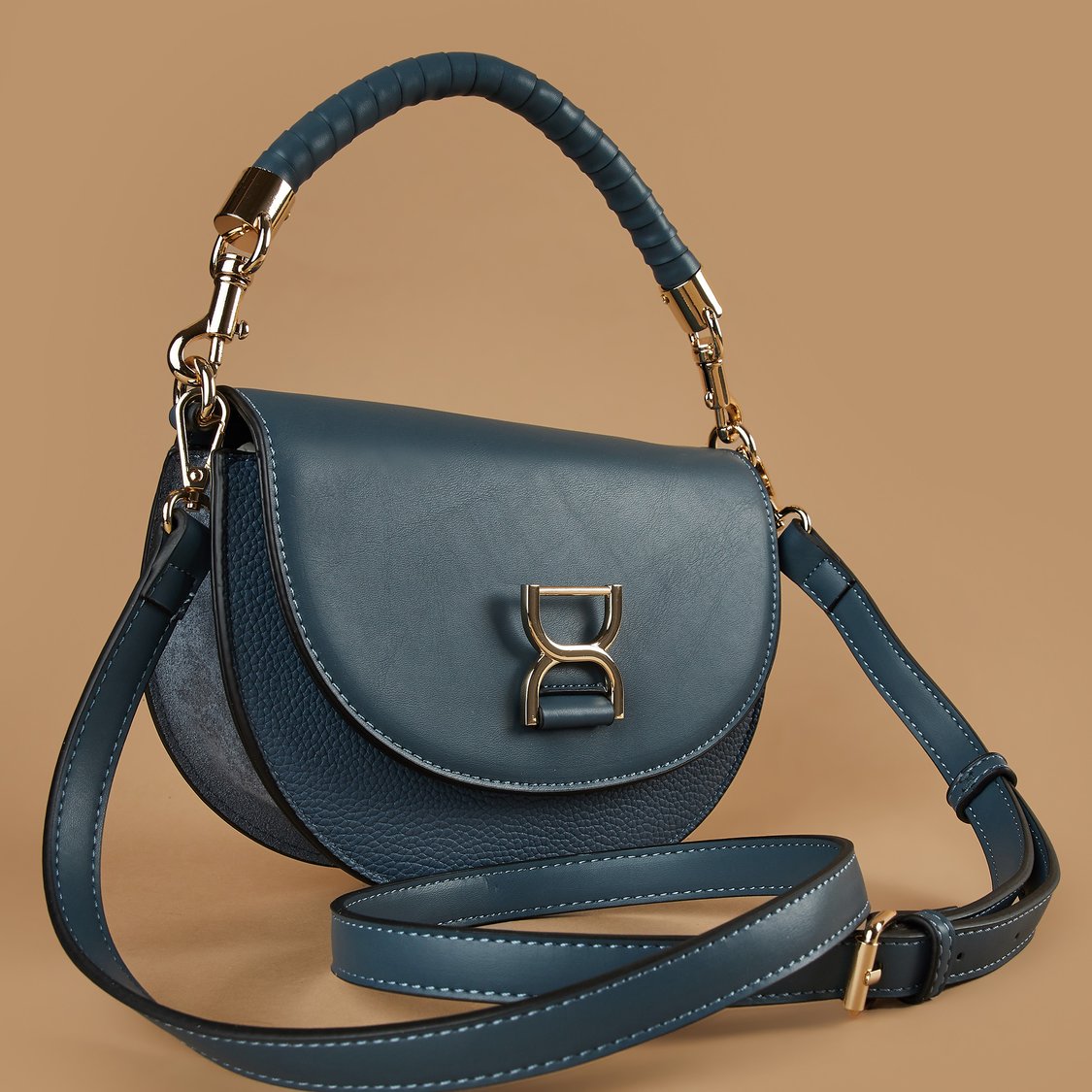 Code Bags Buy CODE Solid Half Moon Handheld Bag from CODE at just INR 2299.0