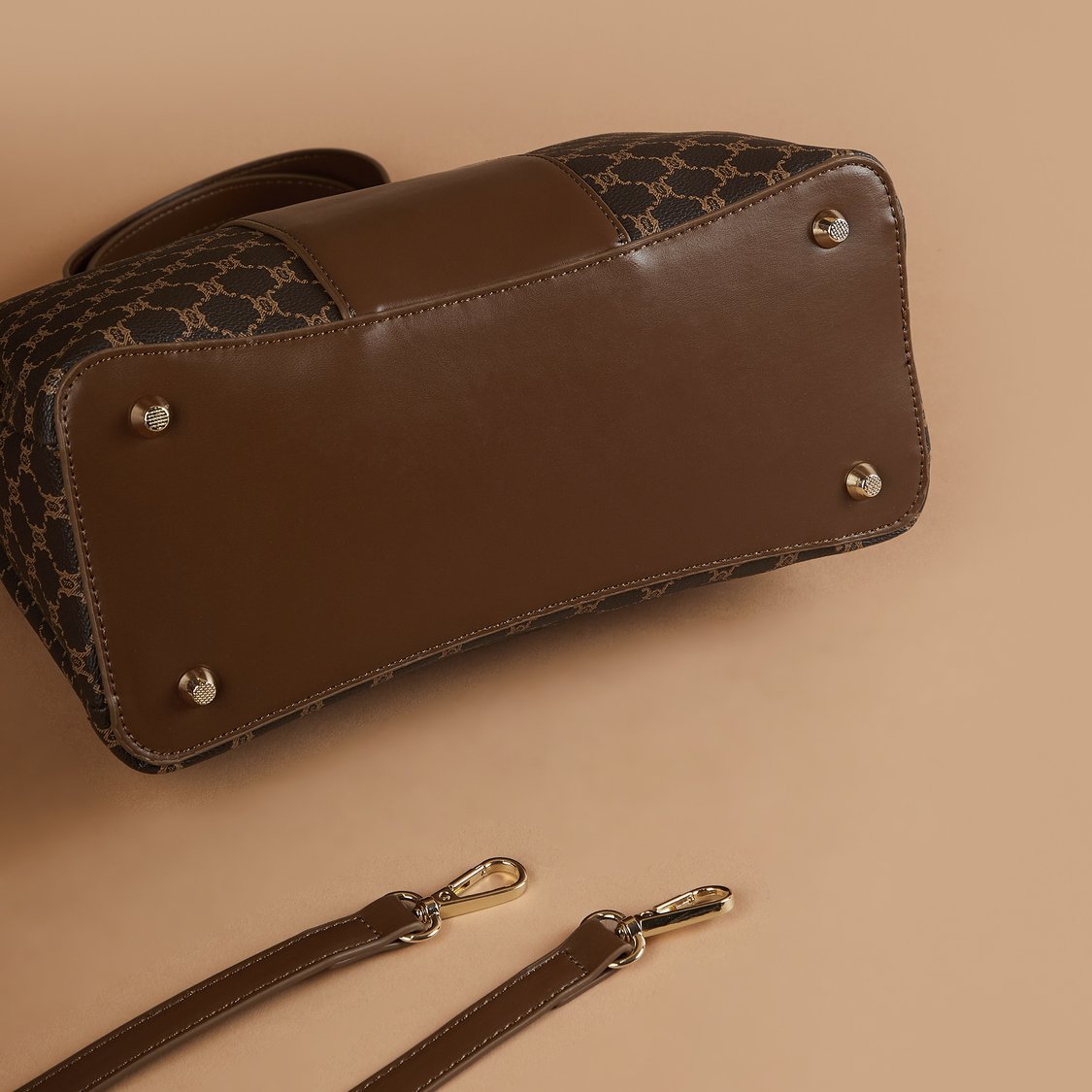 Buy CODE Monogram Print Handheld Bag from CODE at just INR 2299.0
