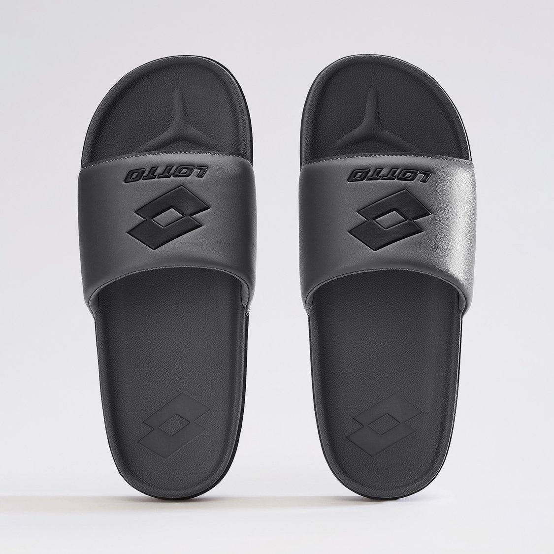 Buy LOTTO Brand Embossed Sliders from Lotto at just INR