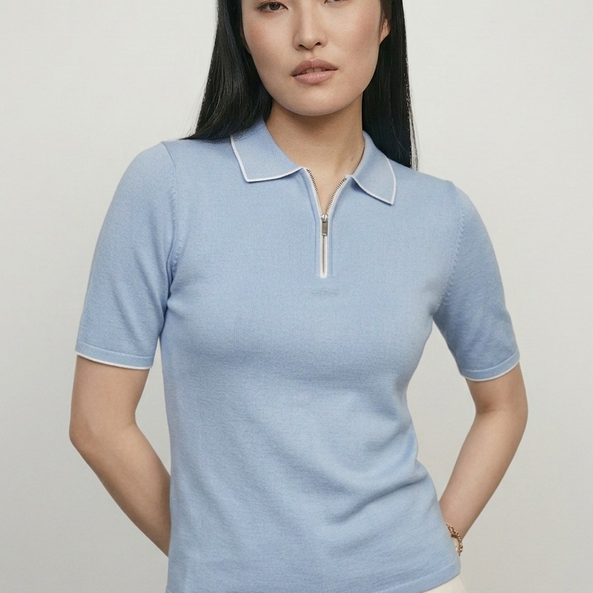 Buy Women Knit Polo T-shirt Online at just Rs. 899.0