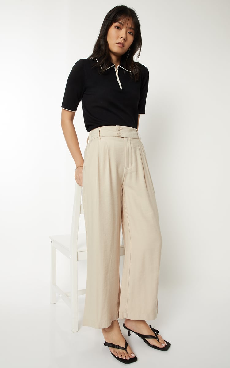 Buy Women Solid Pleated Trousers Online at just Rs. 1299.0