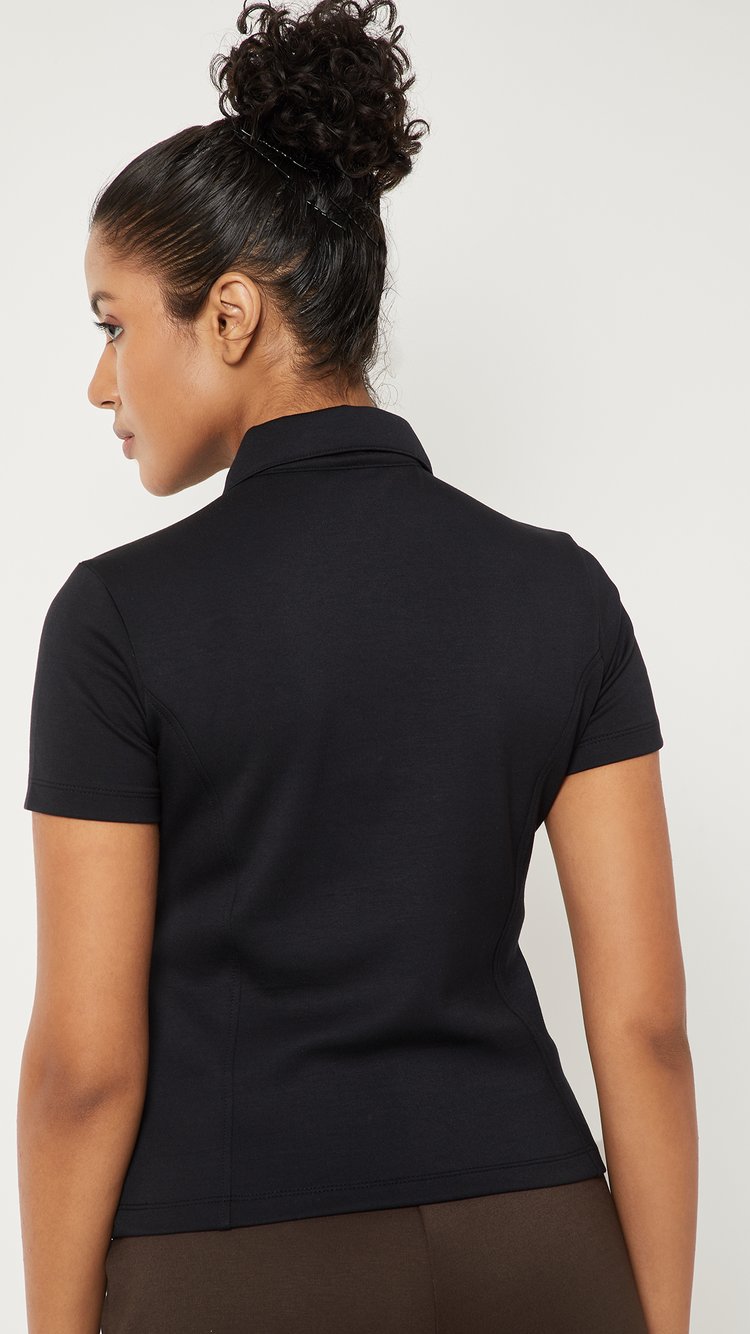 Buy Women Solid Sports Polo T-shirt Online at just Rs. 699.0