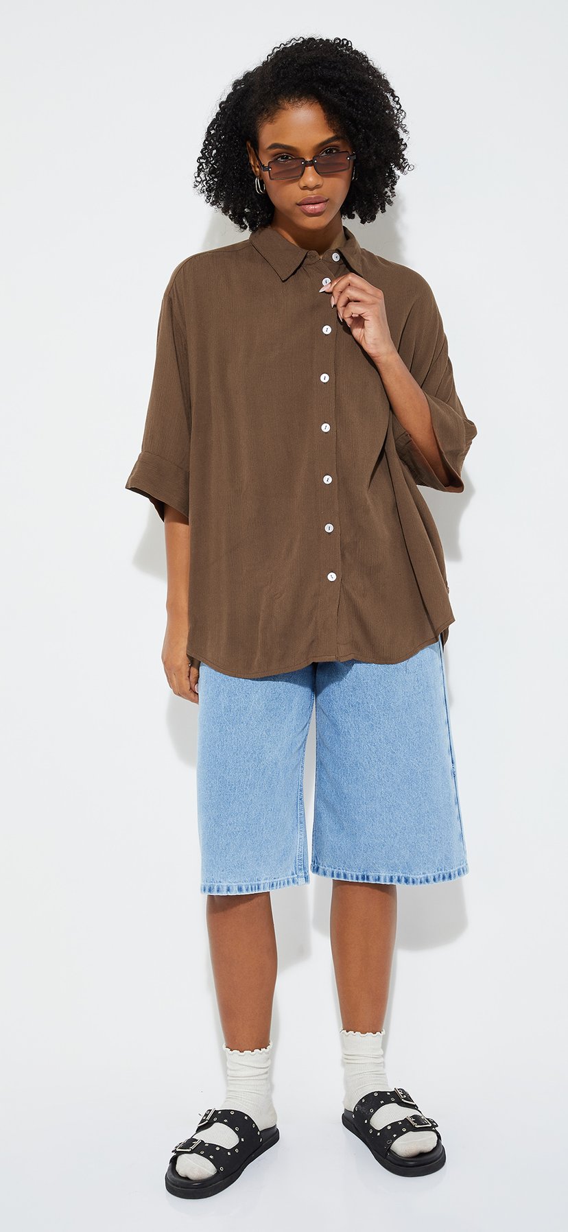 Buy URB_N Women Textured Loose Fit Shirt Online at just Rs. 699.0