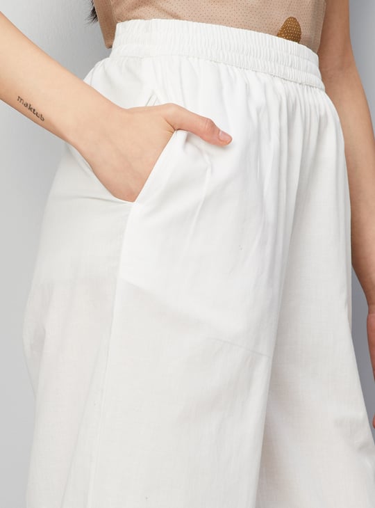 Women Embroidered Palazzos with Scalloped Hem