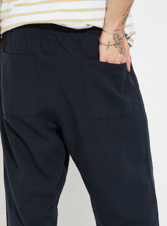 Men Solid Woven Pull-On Pants
