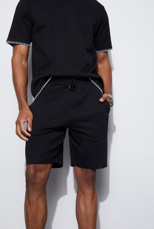 CODE UNWIND Solid Regular Fit Shorts