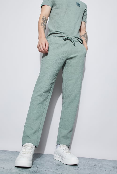 SMILEY WORLD Solid Regular Track Pants