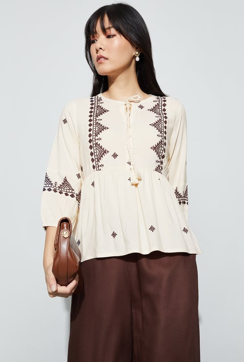 FAME FOREVER Embroidered Tie-Up Peplum Top