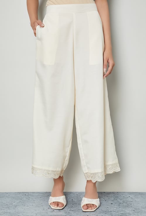 MELANGE Embroidered Hem Palazzos