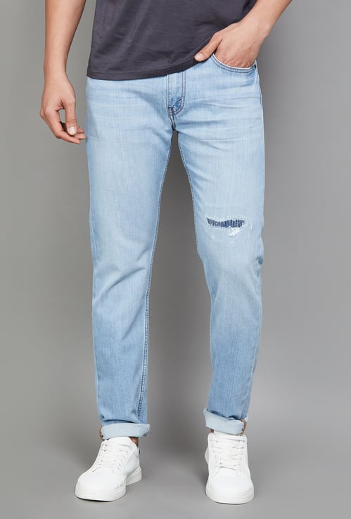 LEVI'S Distressed Slim Tapered Jeans