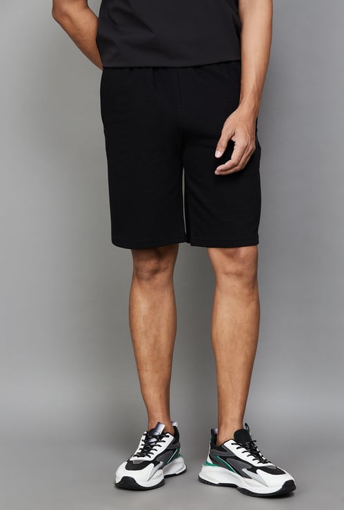 PUMA Textured Slim Shorts