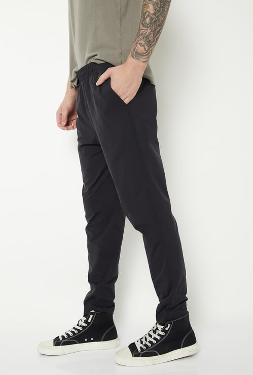 Men Solid Athleisure Track Pants