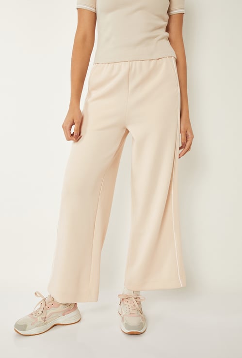 Women Solid Buttersoft Sports Track Pants