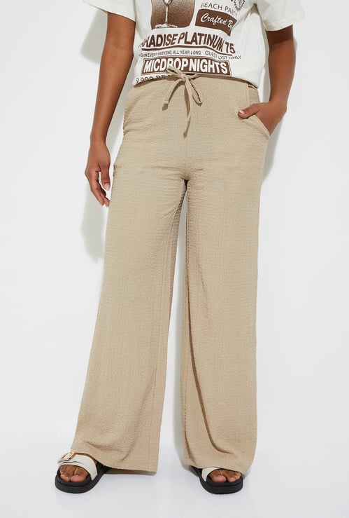 Women Textured Wide Leg Trousers