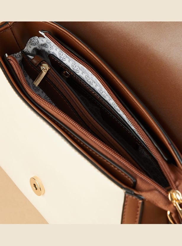 Buy CODE Monogram Print Handheld Bag from CODE at just INR 2299.0