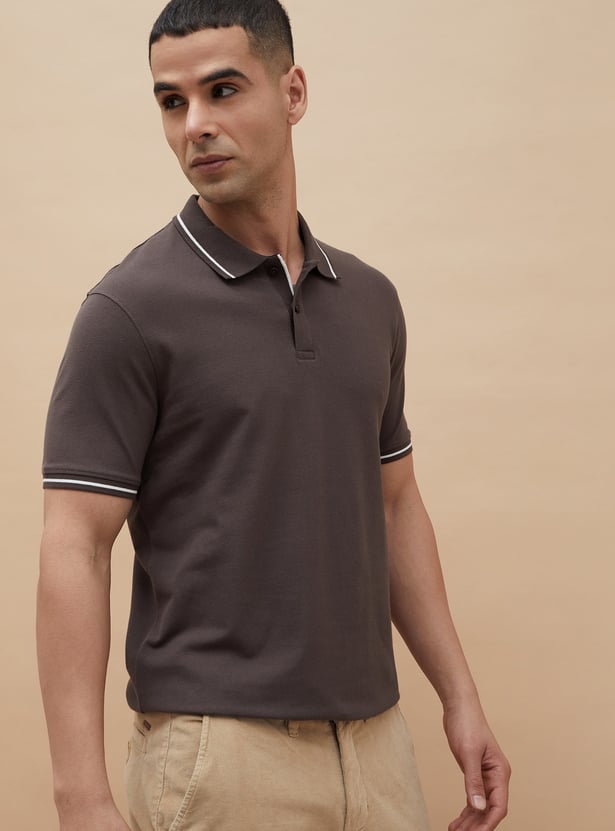 Buy CODE Solid Polo T-shirt from CODE at just INR 899.0