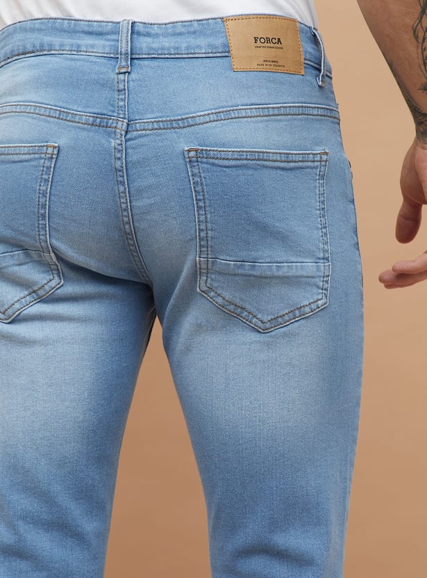 FORCA Light Washed Slim Tapered Jeans