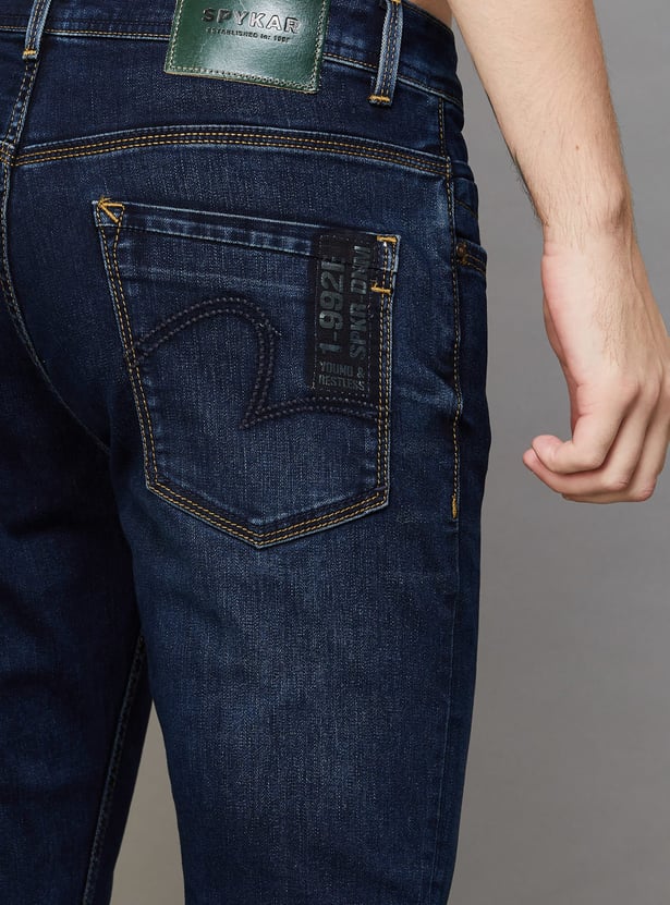 SPYKAR Whiskered Slim Tapered Jeans