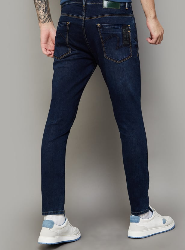 SPYKAR Whiskered Slim Tapered Jeans