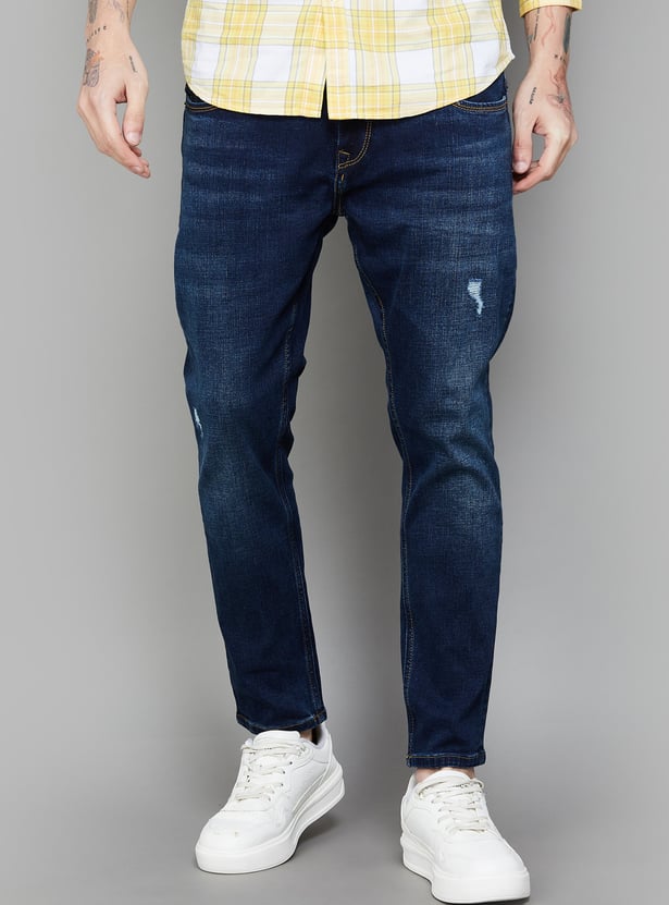 SPYKAR Distressed Slim Tapered Jeans