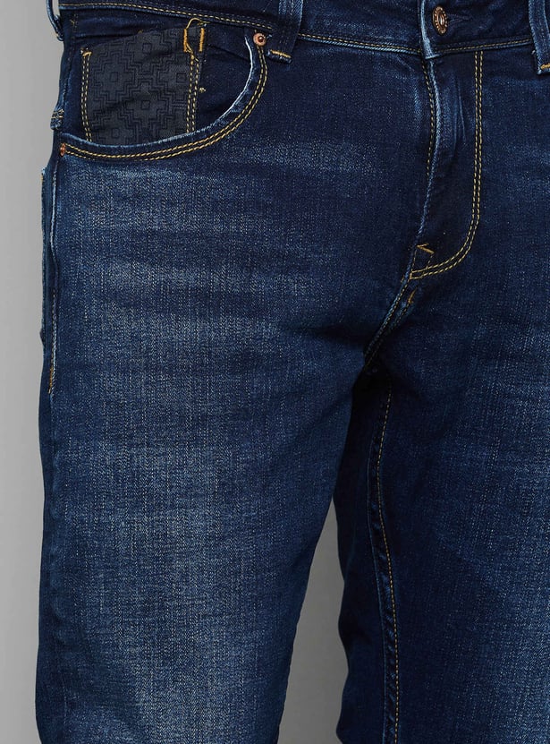 SPYKAR Distressed Slim Tapered Jeans