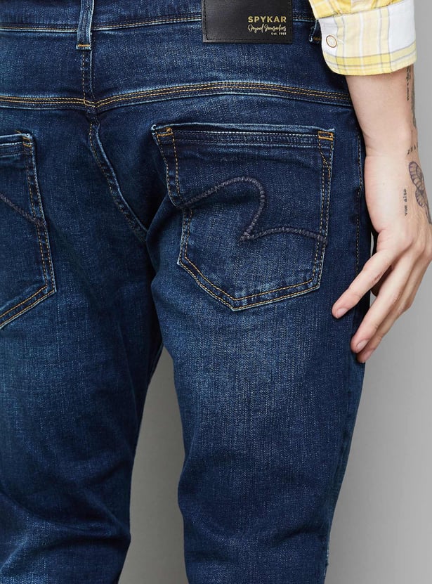 SPYKAR Distressed Slim Tapered Jeans