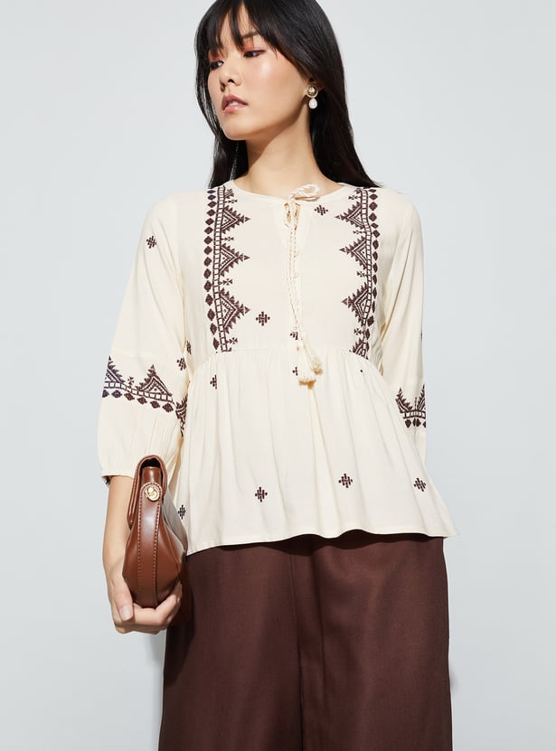 FAME FOREVER Embroidered Tie-Up Peplum Top