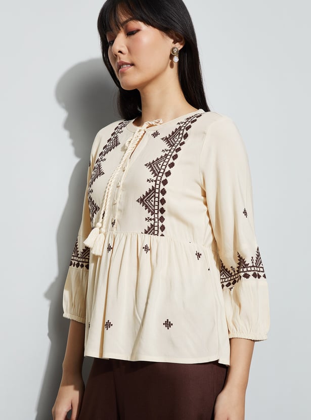 FAME FOREVER Embroidered Tie-Up Peplum Top
