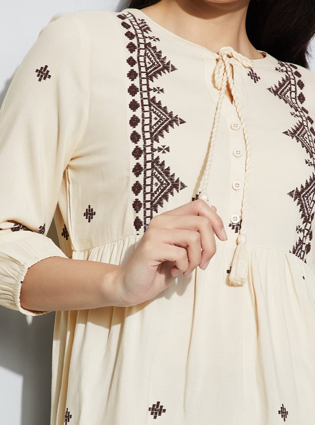 FAME FOREVER Embroidered Tie-Up Peplum Top