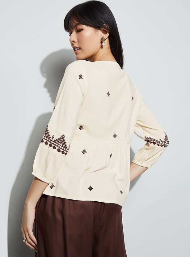FAME FOREVER Embroidered Tie-Up Peplum Top