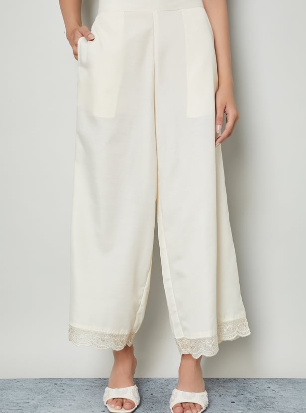 MELANGE Embroidered Hem Palazzos