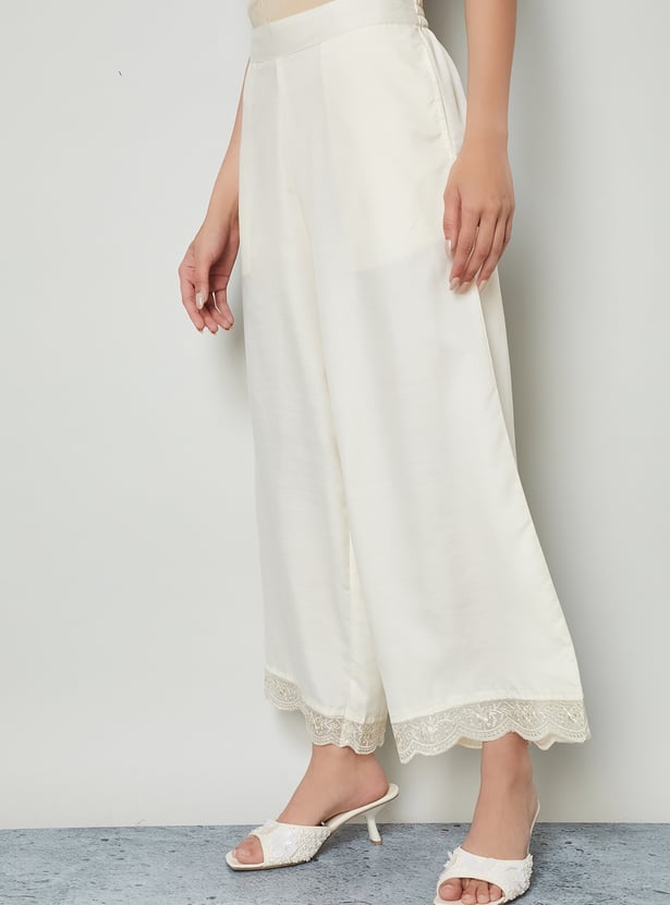 MELANGE Embroidered Hem Palazzos