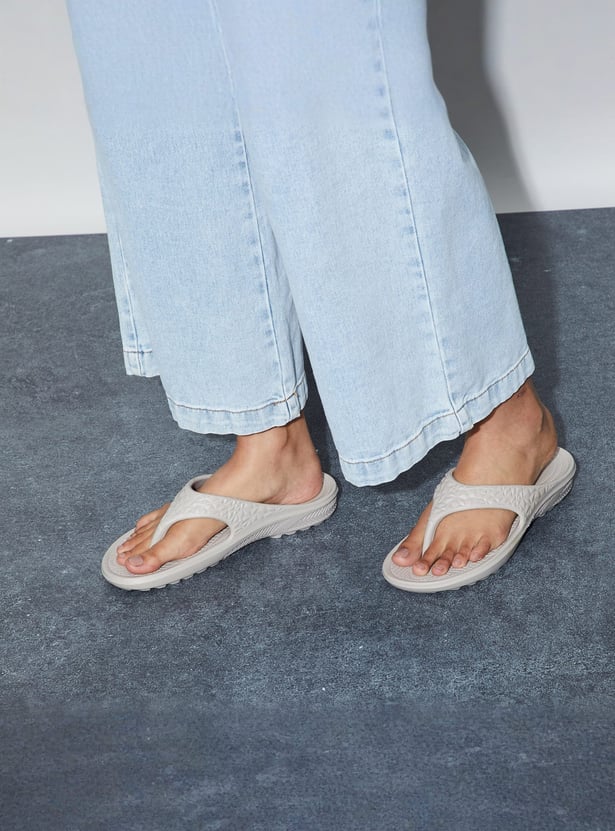 GINGER Embossed Flip Flops