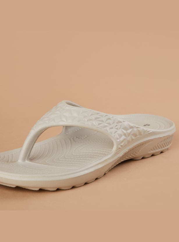 GINGER Embossed Flip Flops