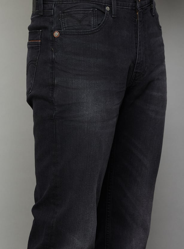 LEVI'S Solid Mid-Rise Regular Tapered Jeans