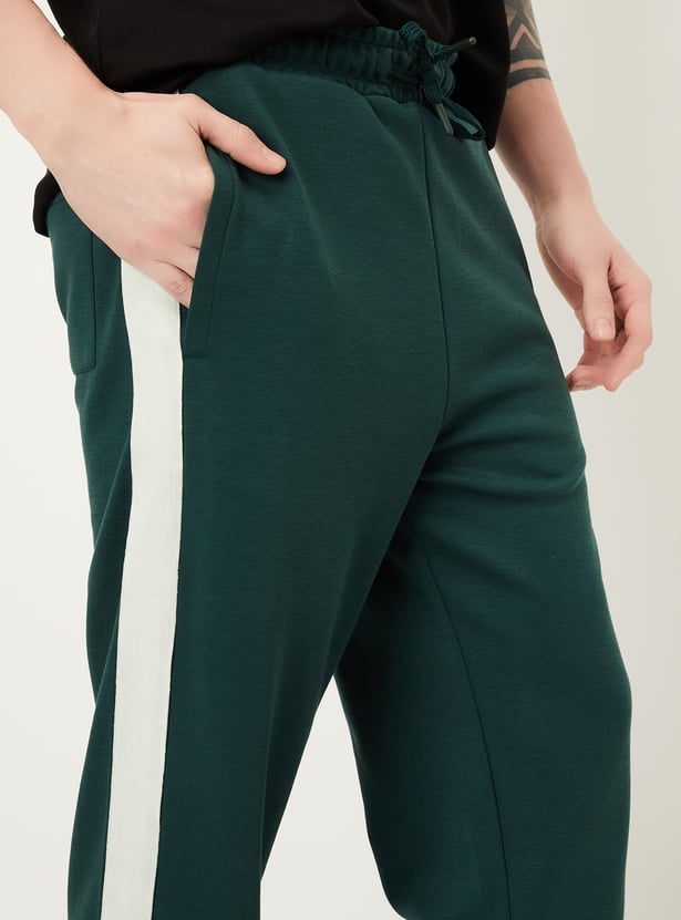 Buy Men Side Taped Sports Track Pants Online at just Rs. 1199.0