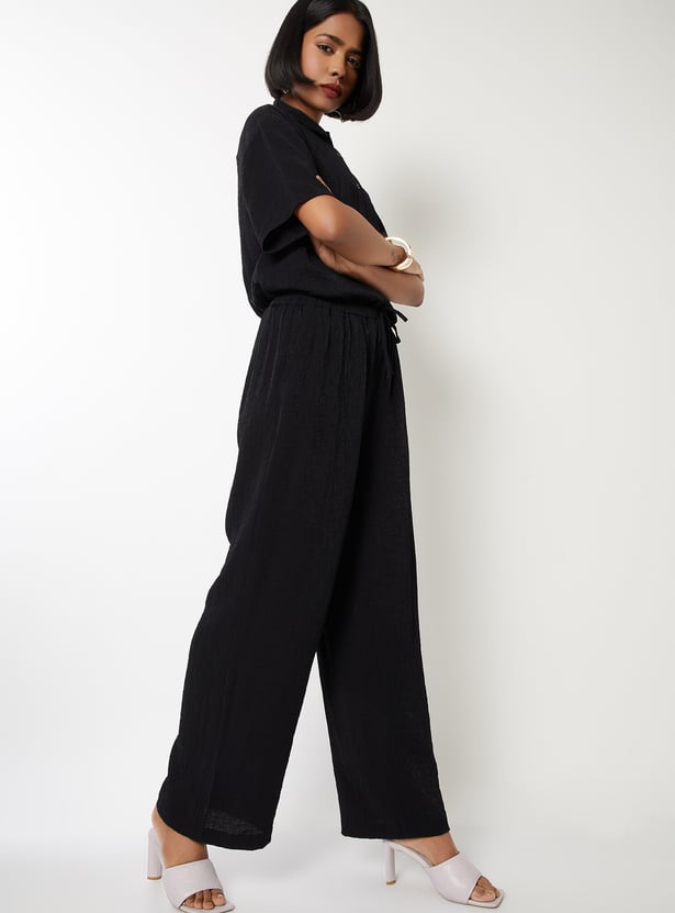 Buy Women Textured Wide Leg Trousers Online at just Rs. 799.0