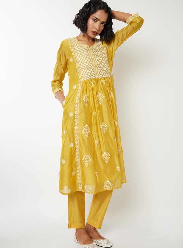 Women Embroidered A-line Kurta Set