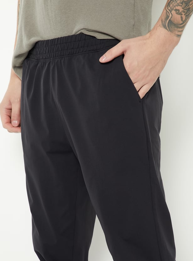 Men Solid Athleisure Track Pants