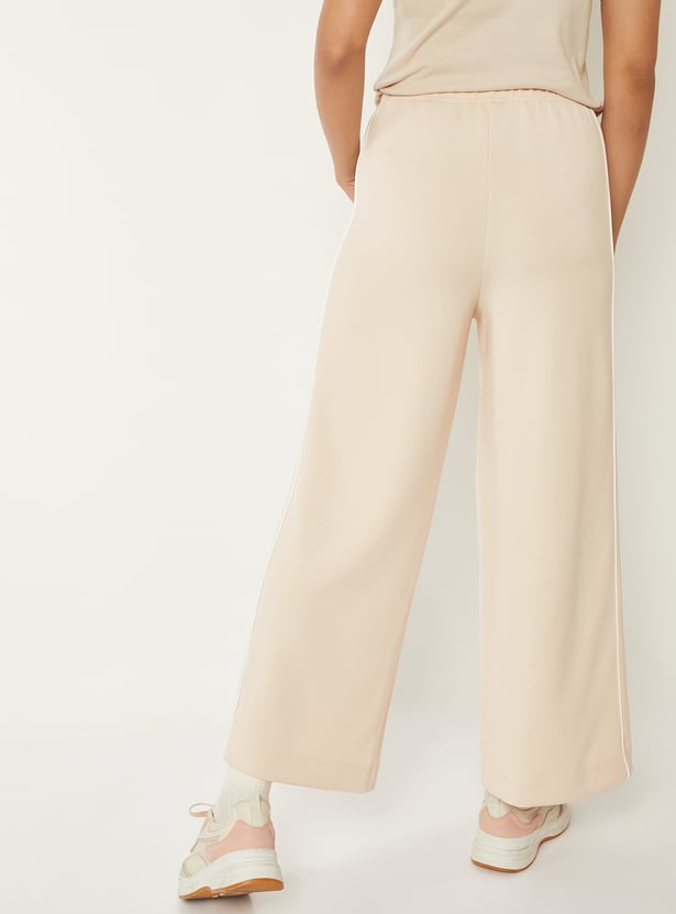 Women Solid Buttersoft Sports Track Pants