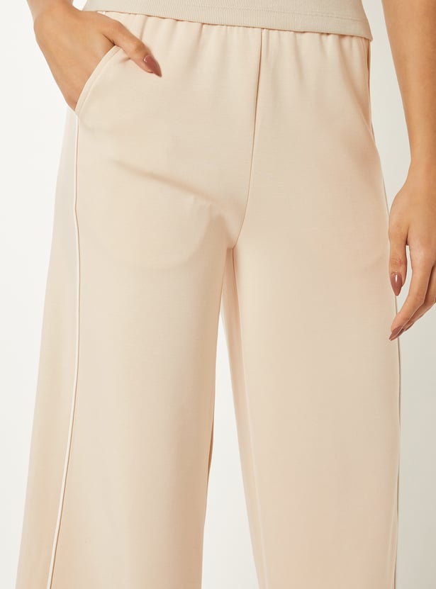 Women Solid Buttersoft Sports Track Pants