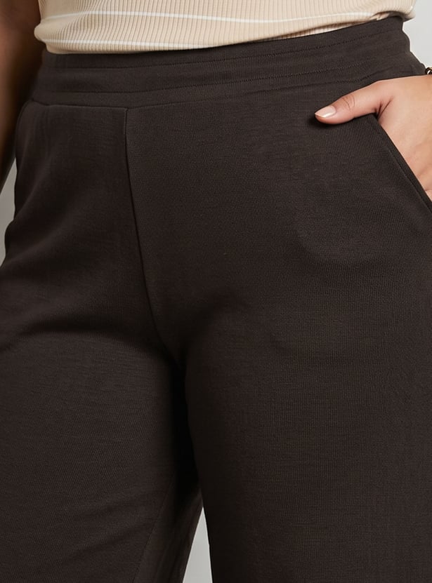 Women Solid Flared Track Pants