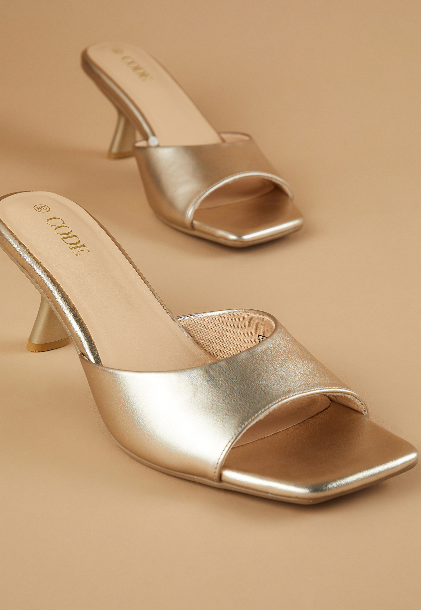 CODE Embossed Spool Heels